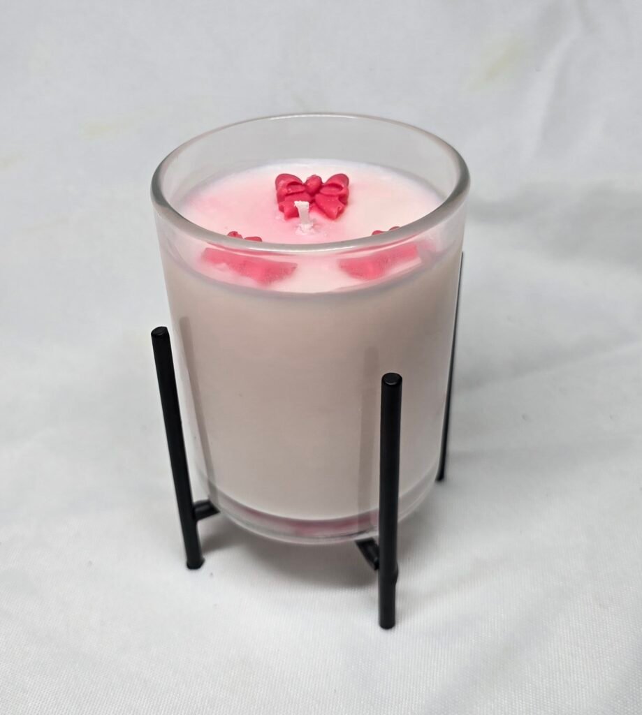 Pink candle with stand